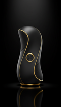 Sculpted wireless speaker with gold accents